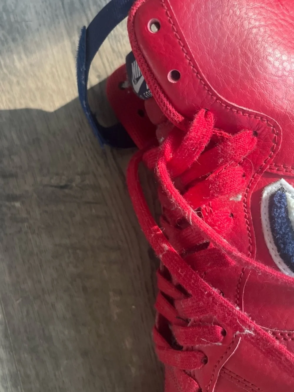 Nike Red High-Top Sneakers with White and Navy Swoosh